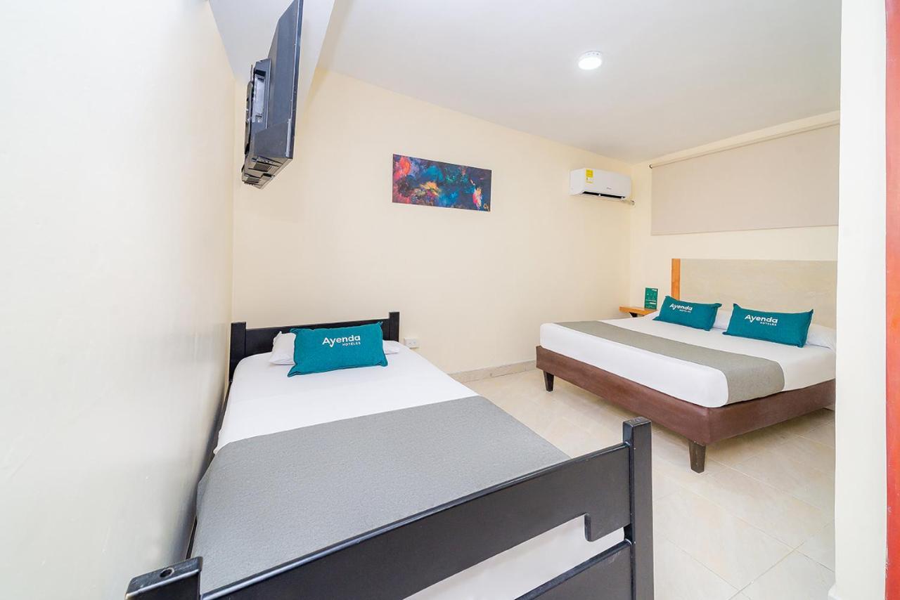 Hotel Ayenda Baly Express Malambo Exterior foto